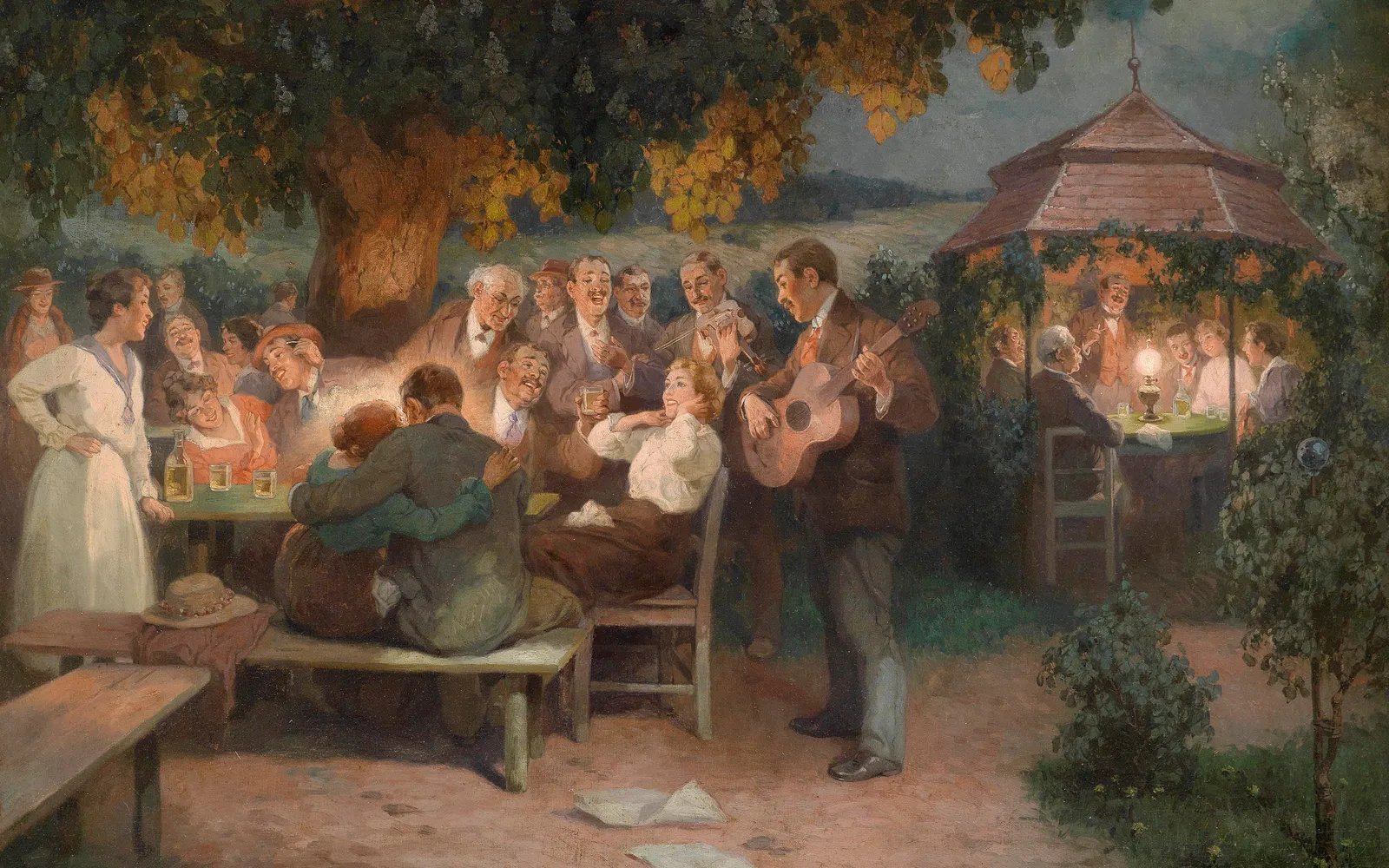 An outdoor table at an Austrian Heuriger, white wine in a clear glass beside a plate of Styrian sausages, dark bread and hard cheese, with grapevines overhead