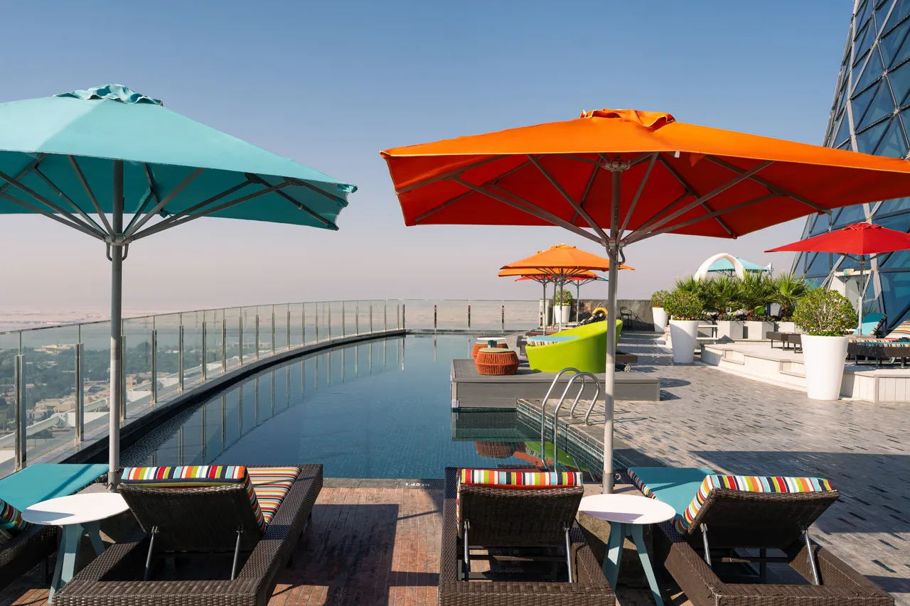 Andaz Capital Gate Abu Dhabi — rooms and atmosphere