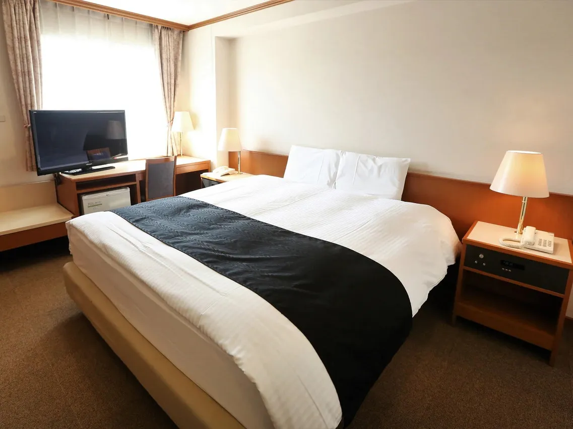 APA Hotel Sapporo Susukino-Ekinishi — rooms and atmosphere