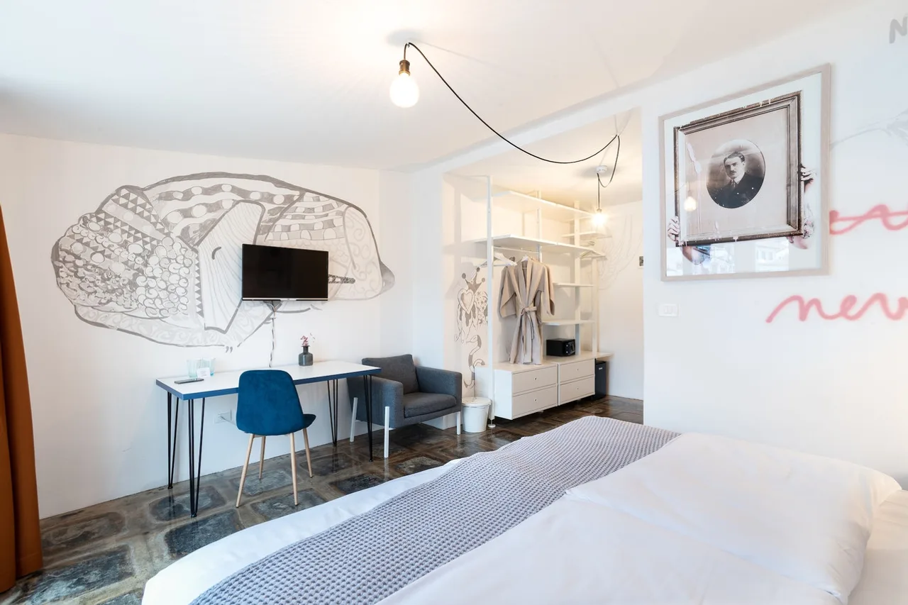 Art Hotel Tartini — ภาพห้องพักและบรรยากาศ