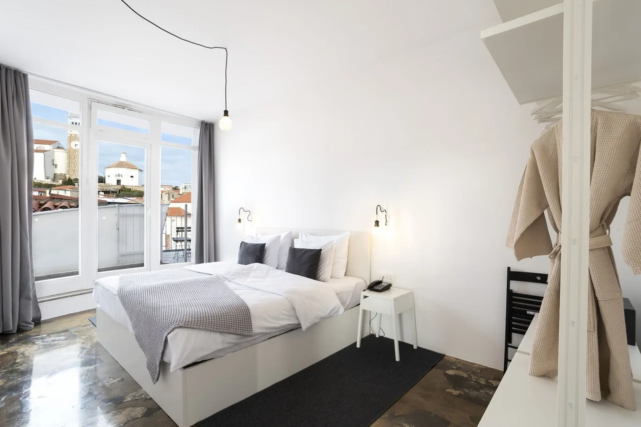 Art Hotel Tartini — ภาพห้องพักและบรรยากาศ