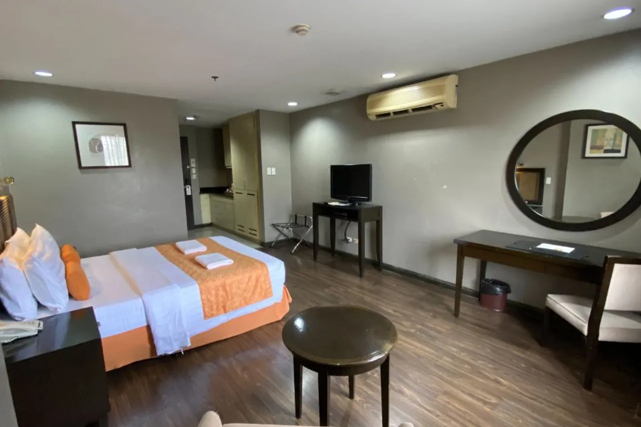 Baguio Burnham Suites Hotel — ภาพห้องพักและบรรยากาศ