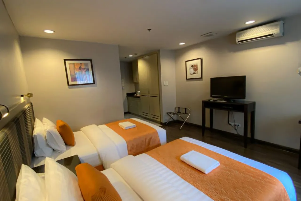 Baguio Burnham Suites Hotel — ภาพห้องพักและบรรยากาศ