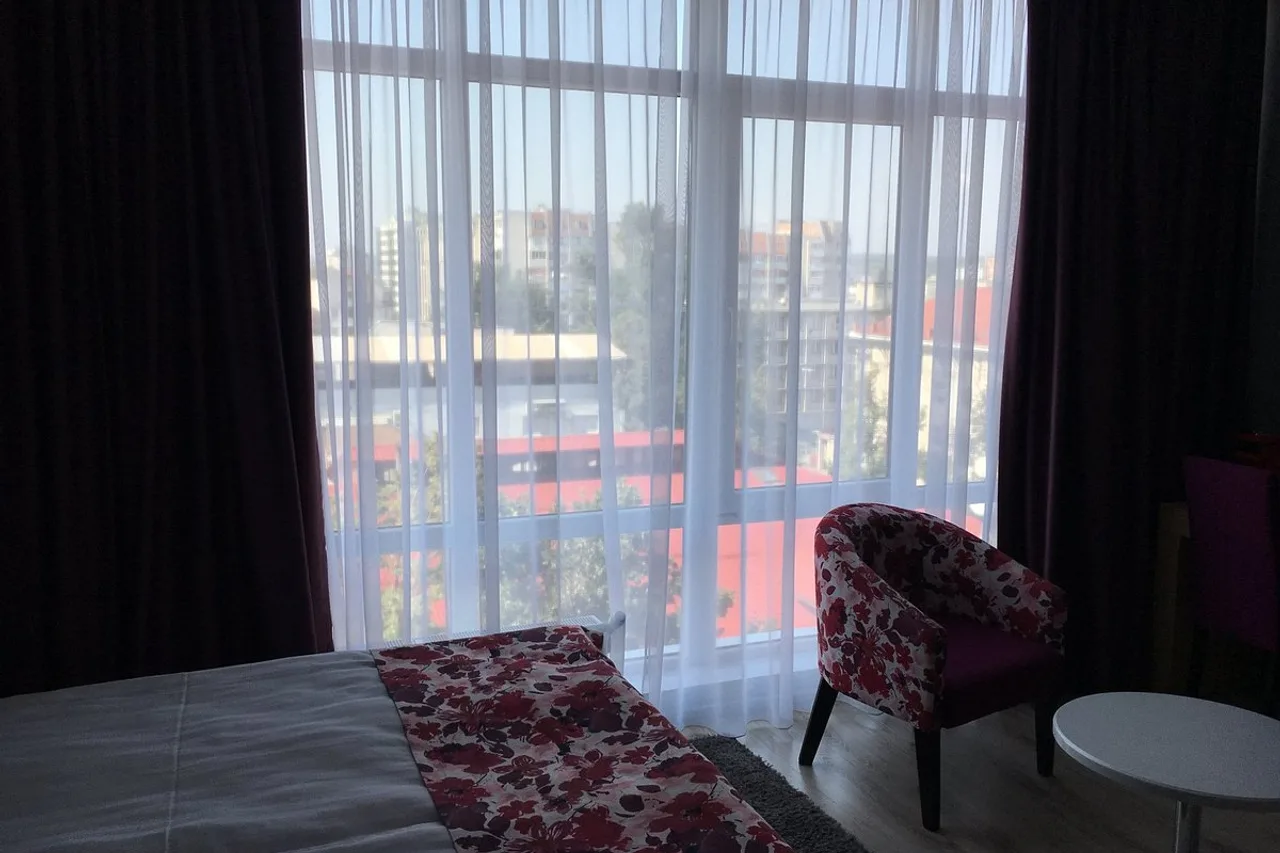 City Park Hotel — ภาพห้องพักและบรรยากาศ