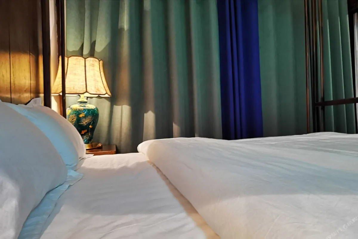 Dali Qingxin Garden Courtyard Hotel — rooms and atmosphere