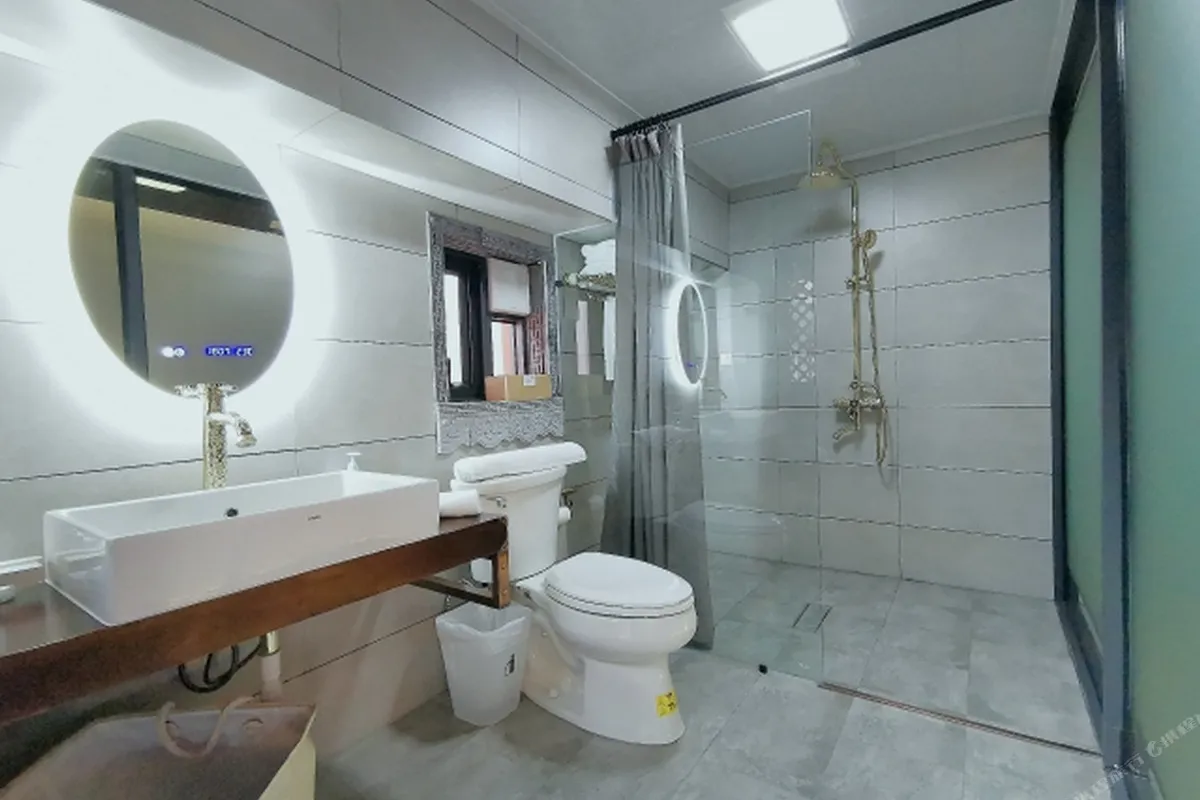 Dali Qingxin Garden Courtyard Hotel — rooms and atmosphere