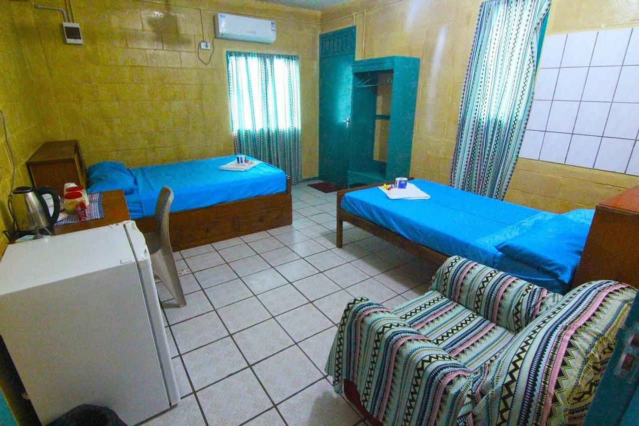 Esfam Lodge — ภาพห้องพักและบรรยากาศ