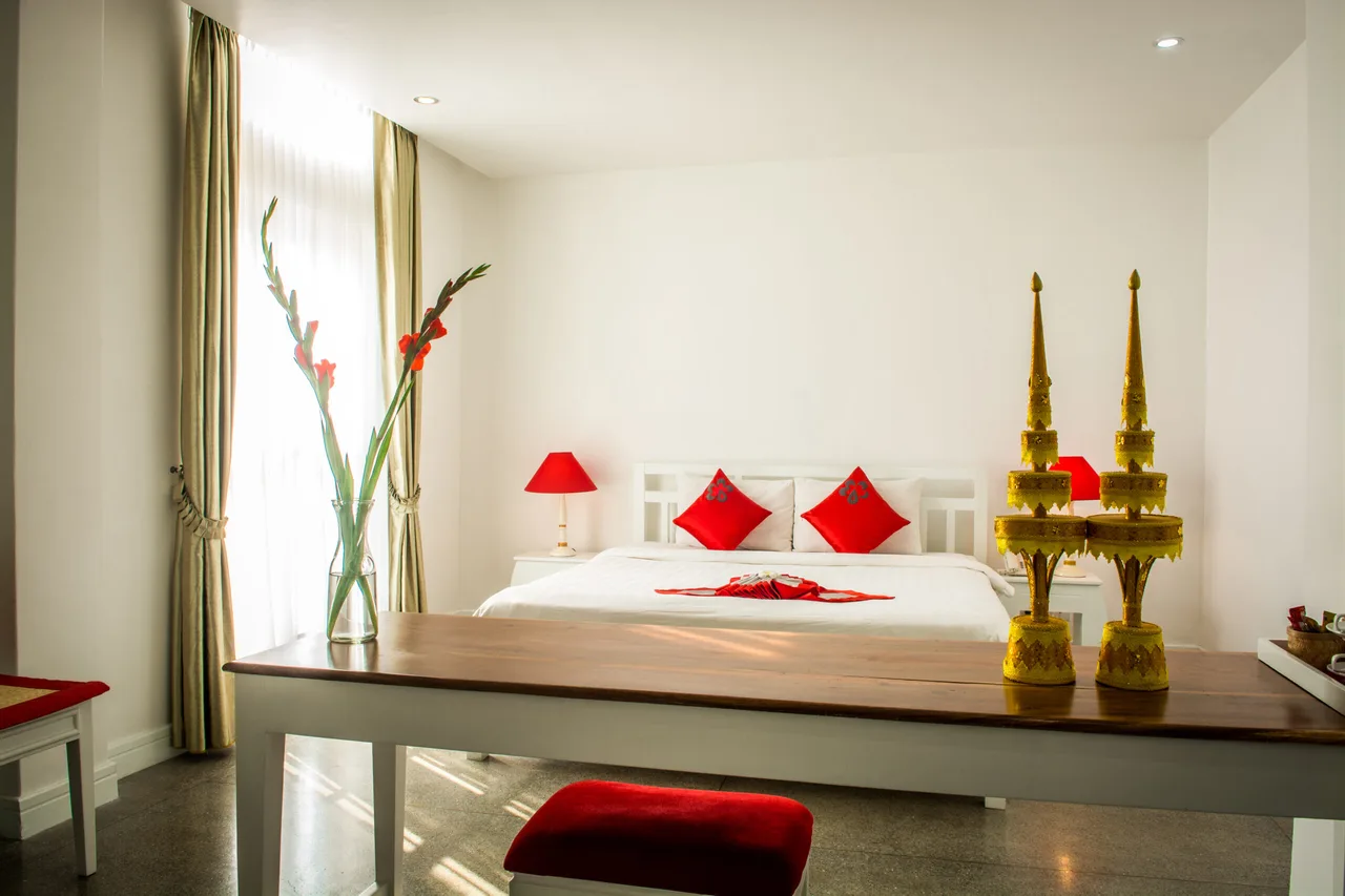The Frangipani Royal Palace Hotel — ภาพห้องพักและบรรยากาศ