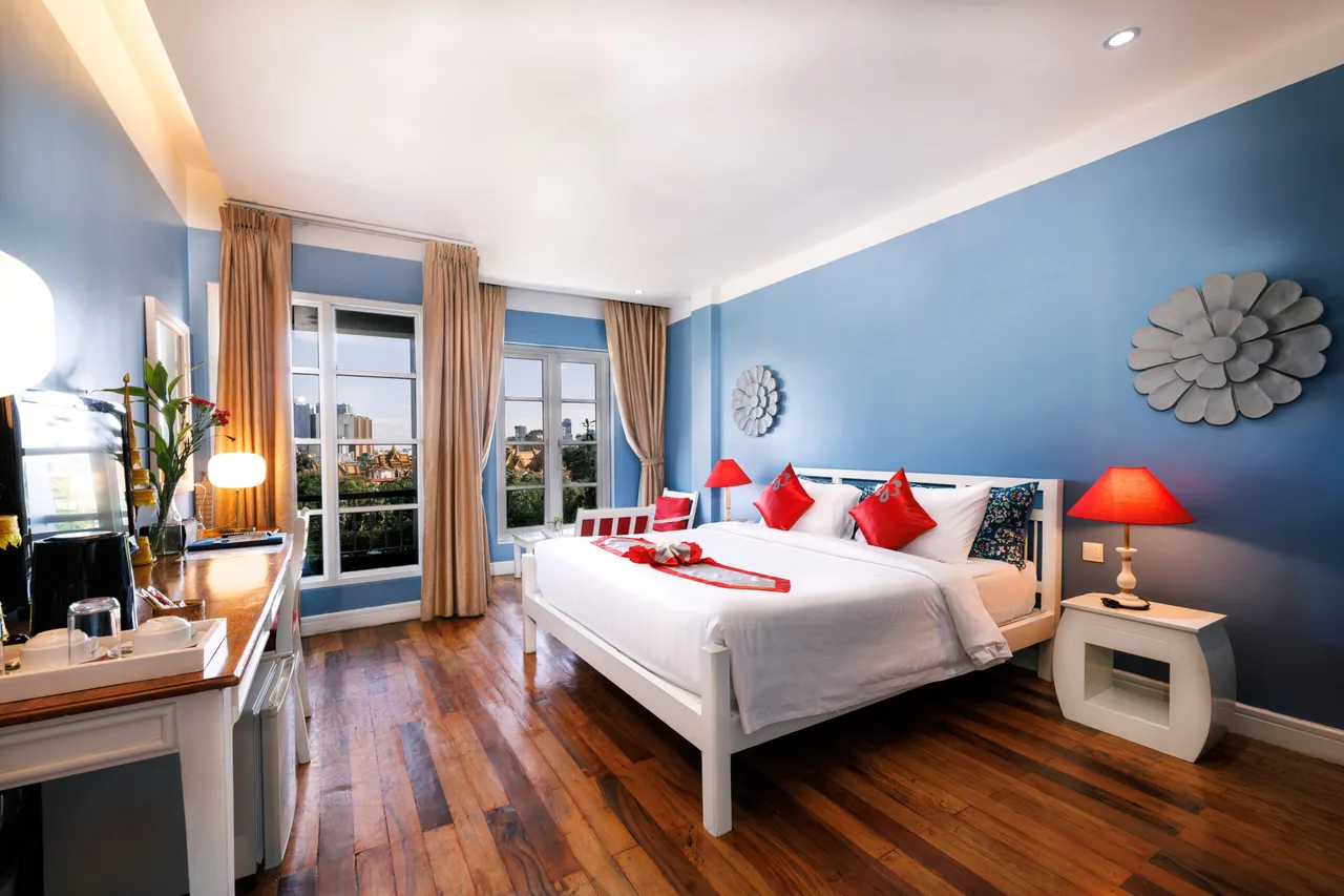 The Frangipani Royal Palace Hotel — ภาพห้องพักและบรรยากาศ