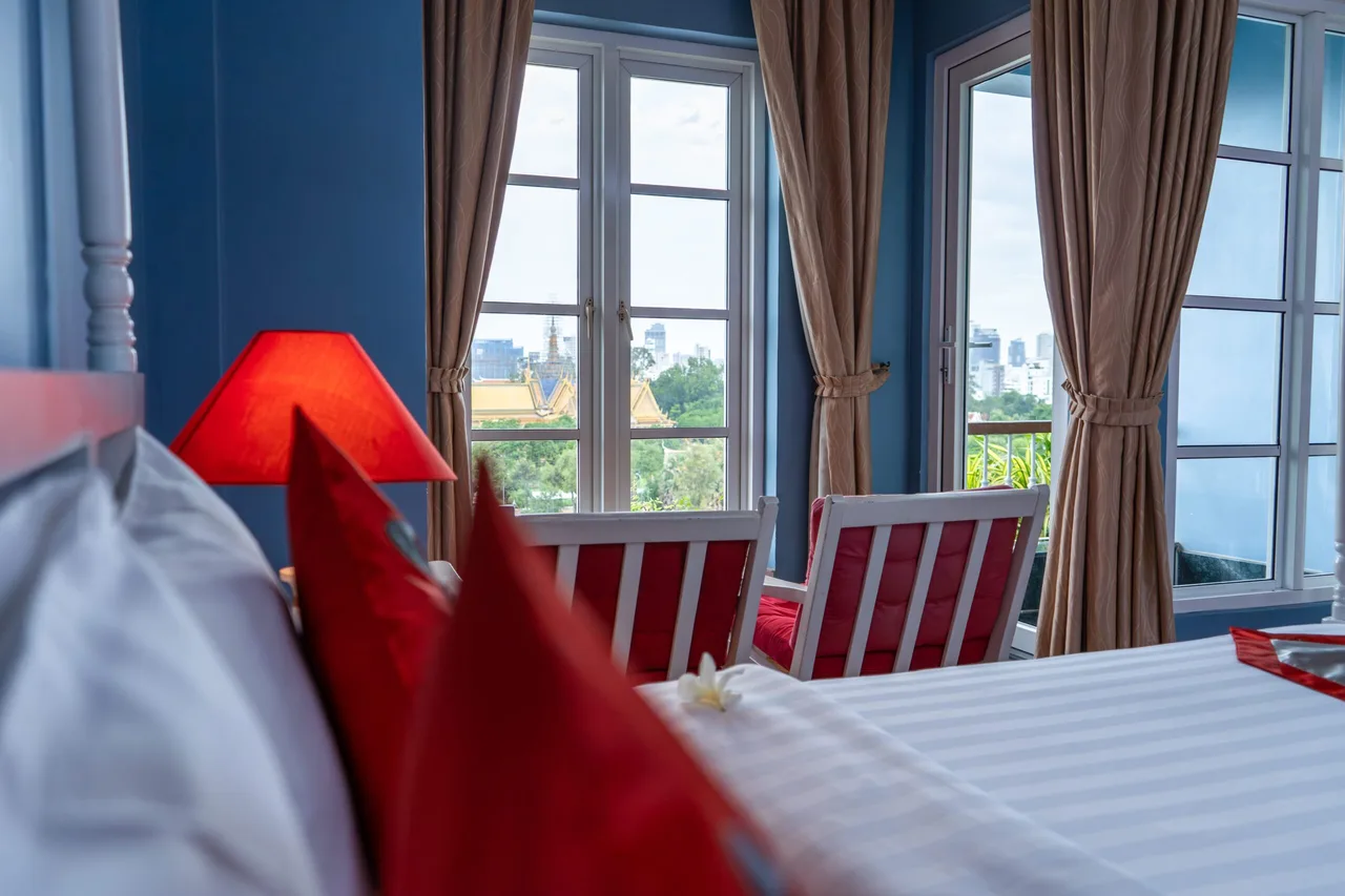 The Frangipani Royal Palace Hotel — ภาพห้องพักและบรรยากาศ