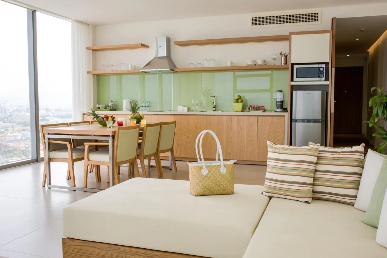 Fusion Suites Danang Beach — rooms and atmosphere