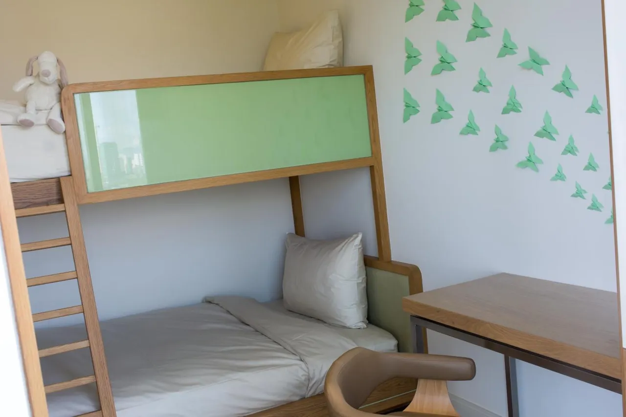 Fusion Suites Danang Beach — rooms and atmosphere