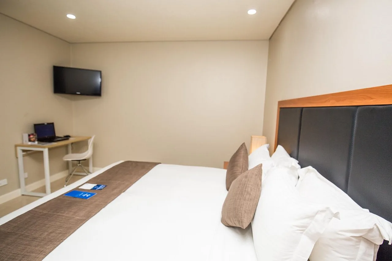 Gateway Hotel and Apartments — ภาพห้องพักและบรรยากาศ