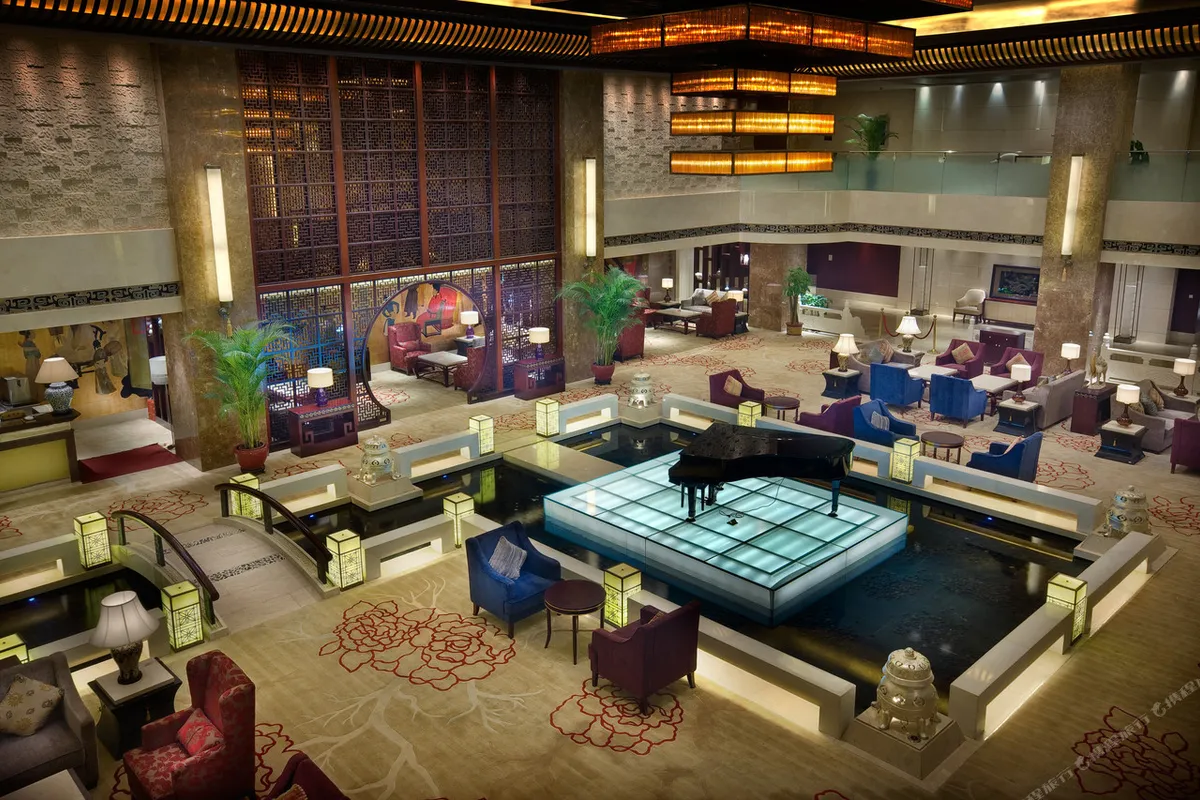 Grand Soluxe International Hotel Xi'an — rooms and atmosphere