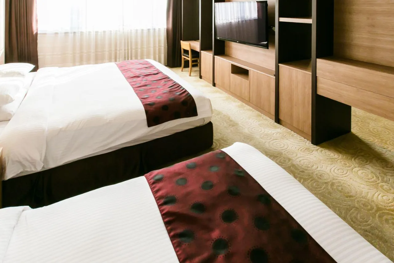 Gyeongju GG Tourist Hotel — rooms and atmosphere