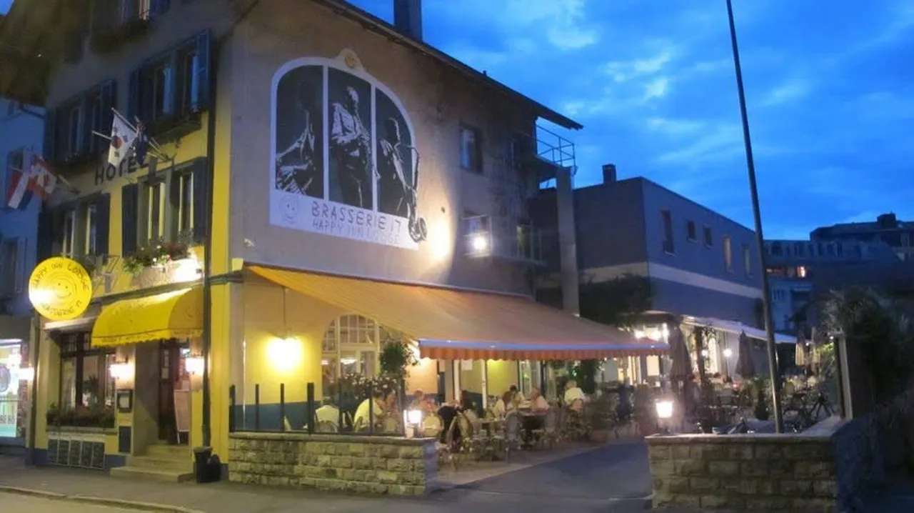 Happy Inn Lodge Interlaken — rooms and atmosphere
