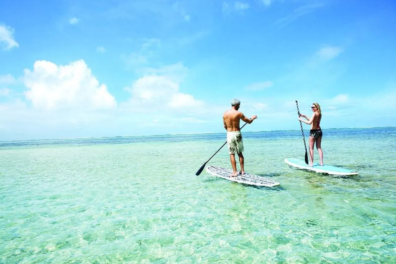 Heritage Le Telfair Golf & Wellness Resort — rooms and atmosphere