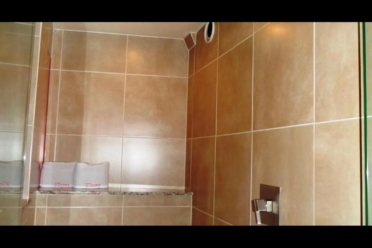 Hotel Cuore — ภาพห้องพักและบรรยากาศ