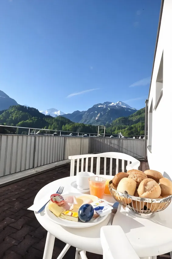 Hotel Merkur West Station Interlaken — rooms and atmosphere