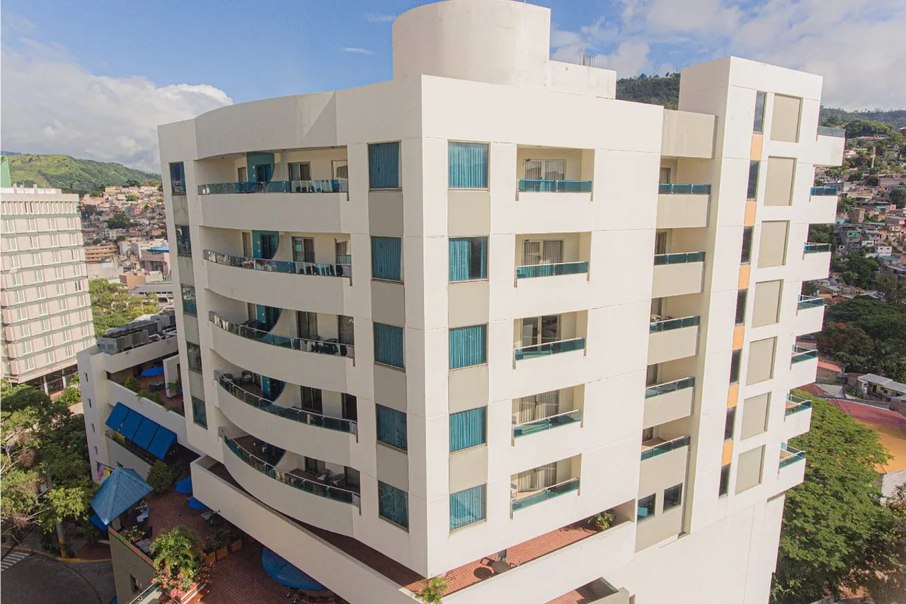 Hotel Plaza Juan Carlos — ภาพห้องพักและบรรยากาศ