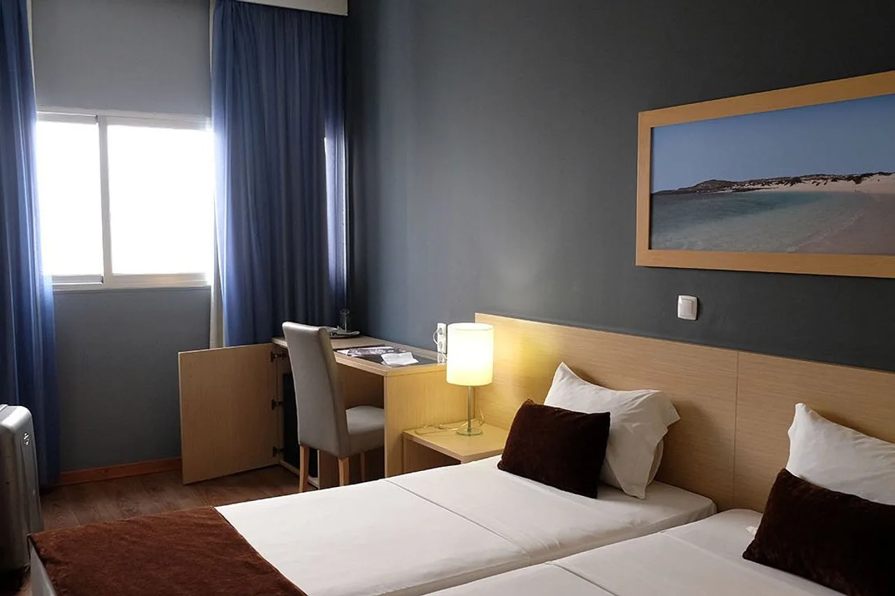 Hotel Santiago — ภาพห้องพักและบรรยากาศ