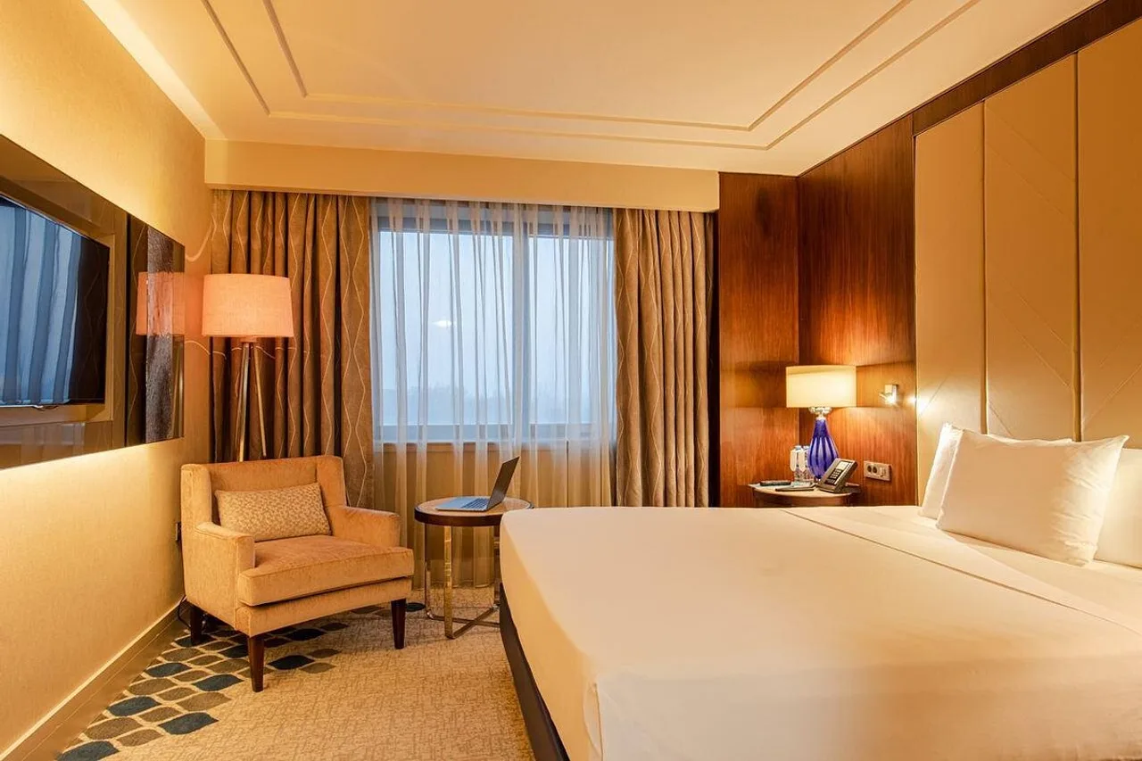 International Hotel Tashkent — ภาพห้องพักและบรรยากาศ