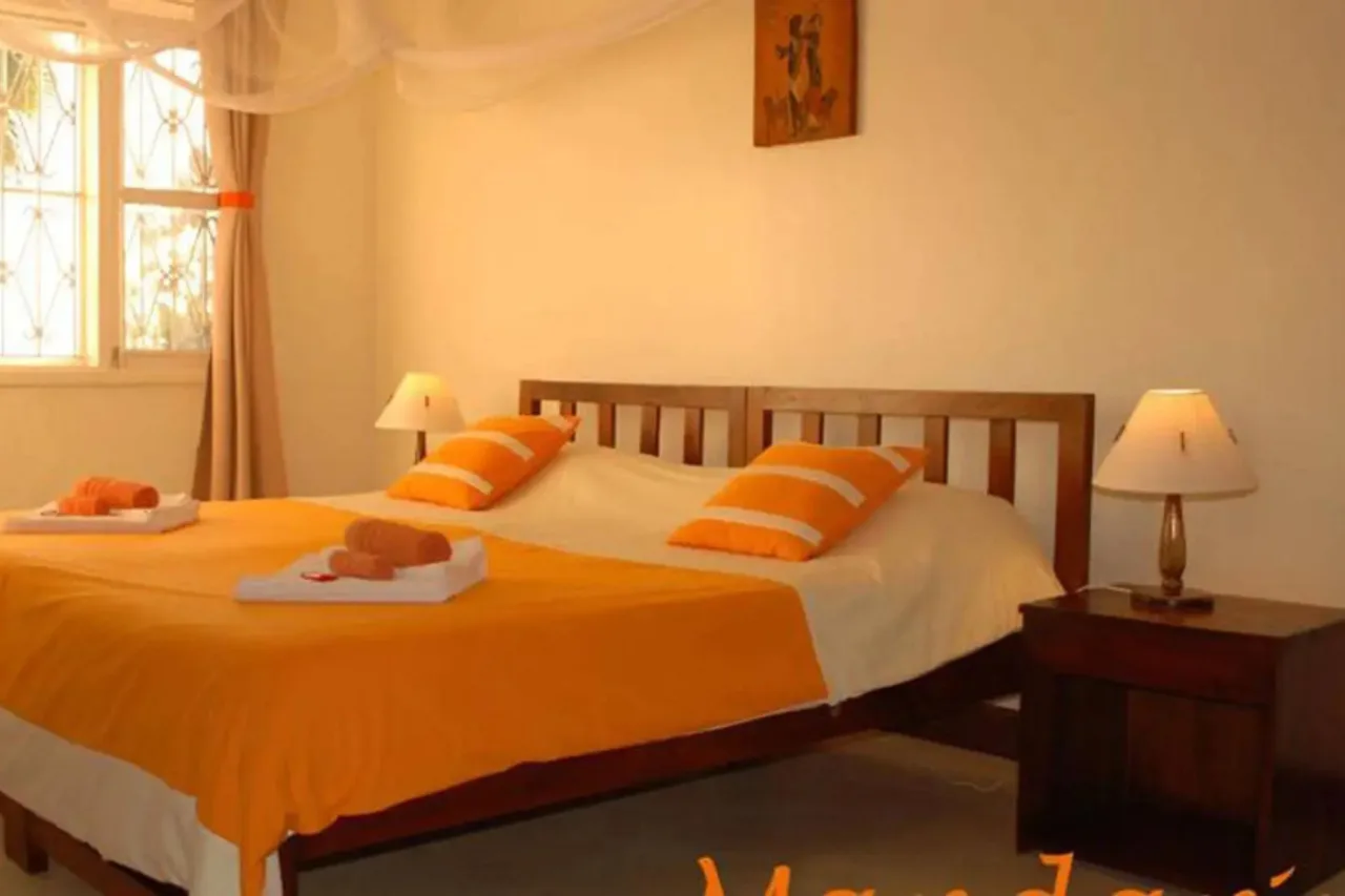 Karibu Guesthouse Entebbe — ภาพห้องพักและบรรยากาศ