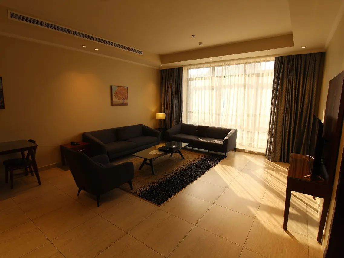 Lotaz Hotel Suites — rooms and atmosphere