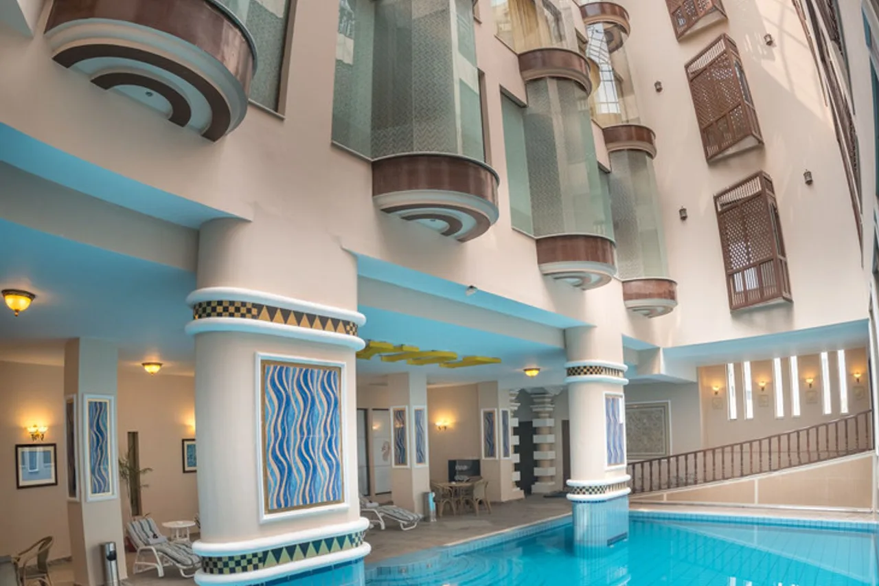 Luxus Grand Hotel — ภาพห้องพักและบรรยากาศ