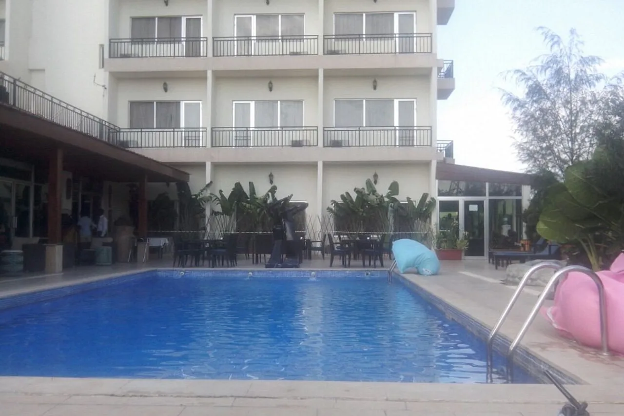 Mikhael's Hotel & Residence — ภาพห้องพักและบรรยากาศ