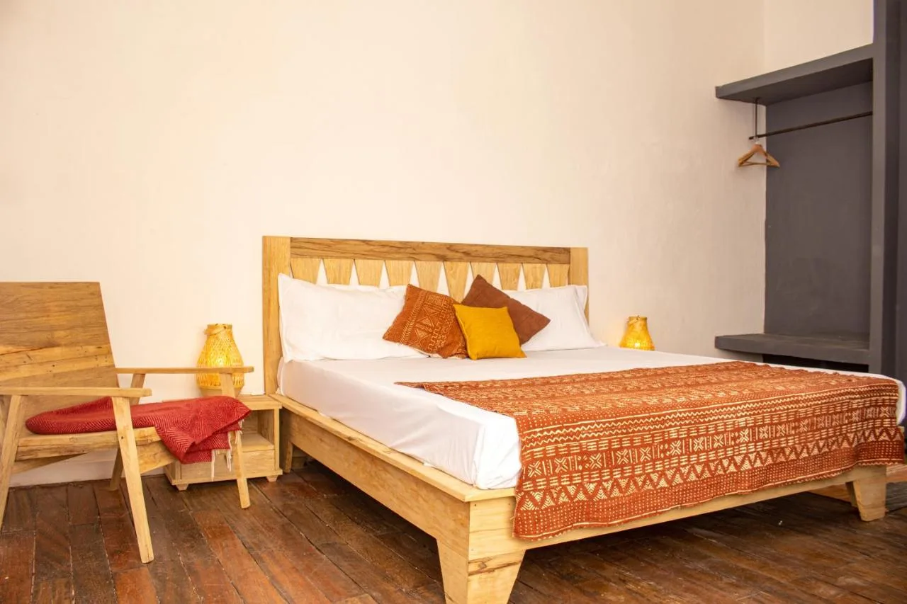 Ndar Ndar House — ภาพห้องพักและบรรยากาศ