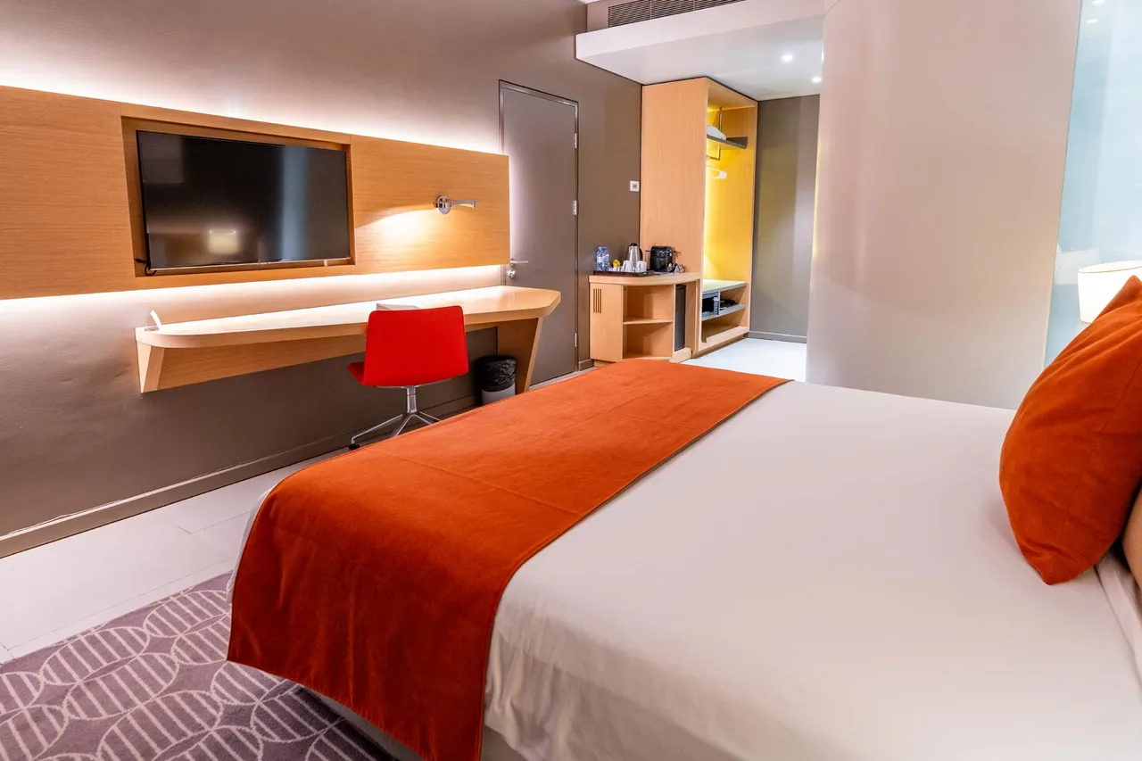 Noom Hotel Conakry — ภาพห้องพักและบรรยากาศ