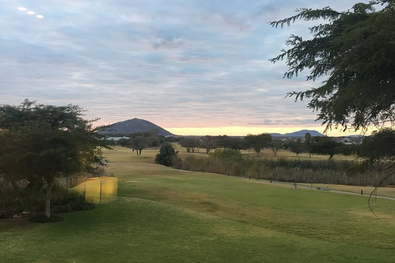 Phakalane Golf Estate Hotel Resort — rooms and atmosphere