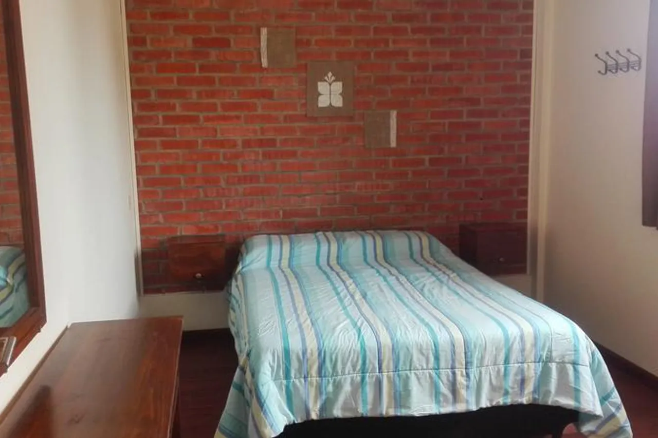 Piedra Blanca Backpackers Hostel — ภาพห้องพักและบรรยากาศ