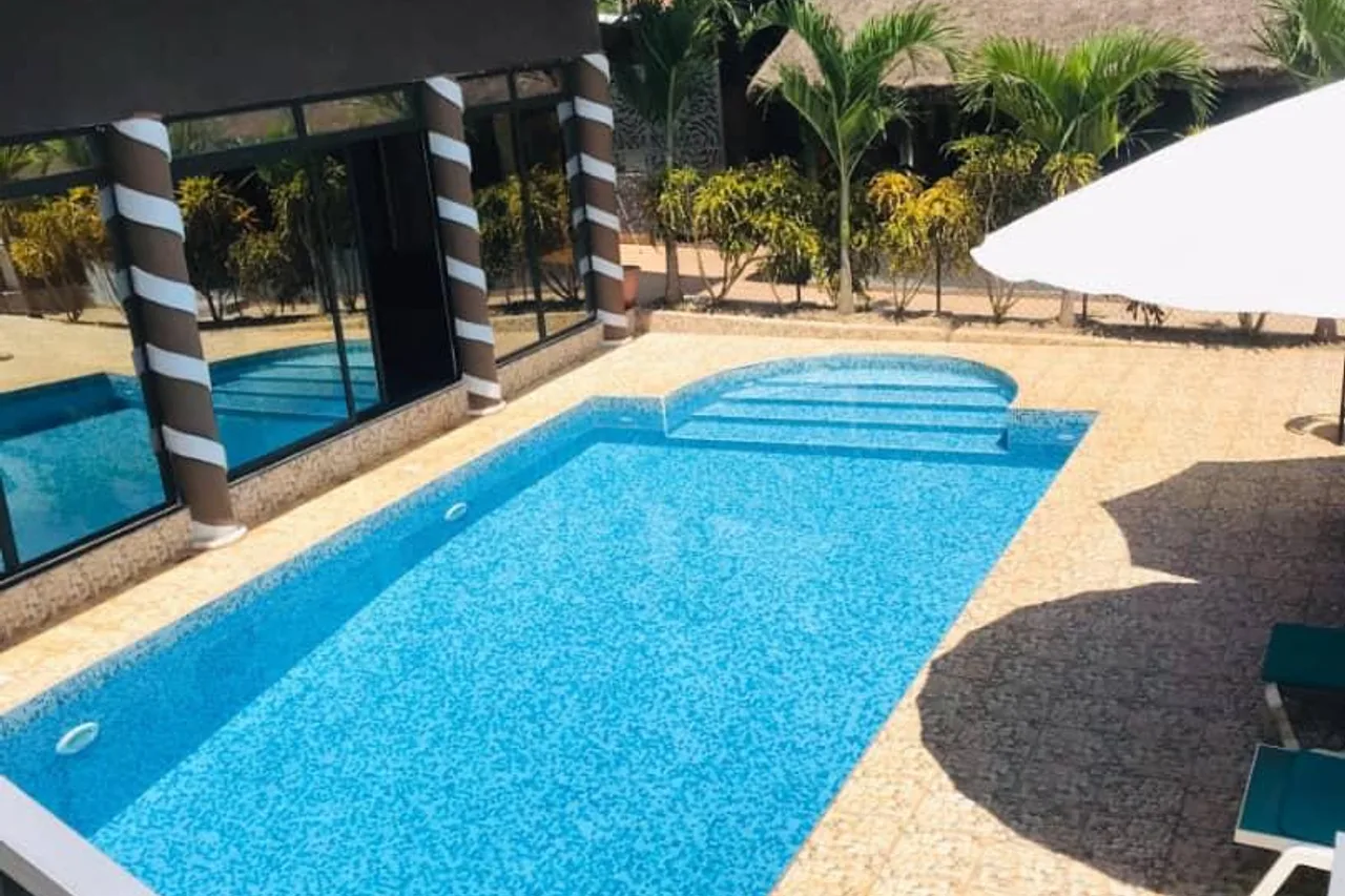 Résidence La Paix Yamoussoukro, L'Oasis — ภาพห้องพักและบรรยากาศ
