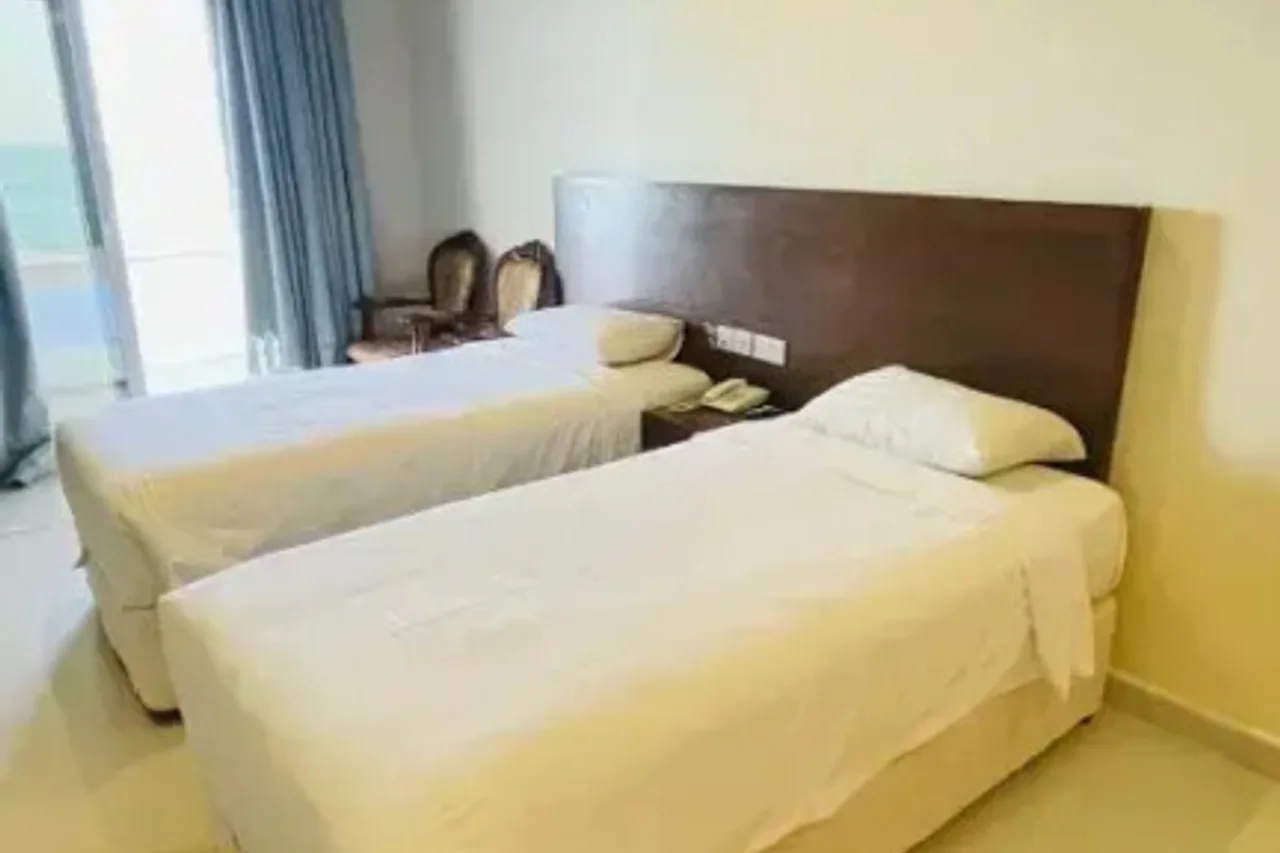 Resort Sur Beach Holiday — ภาพห้องพักและบรรยากาศ