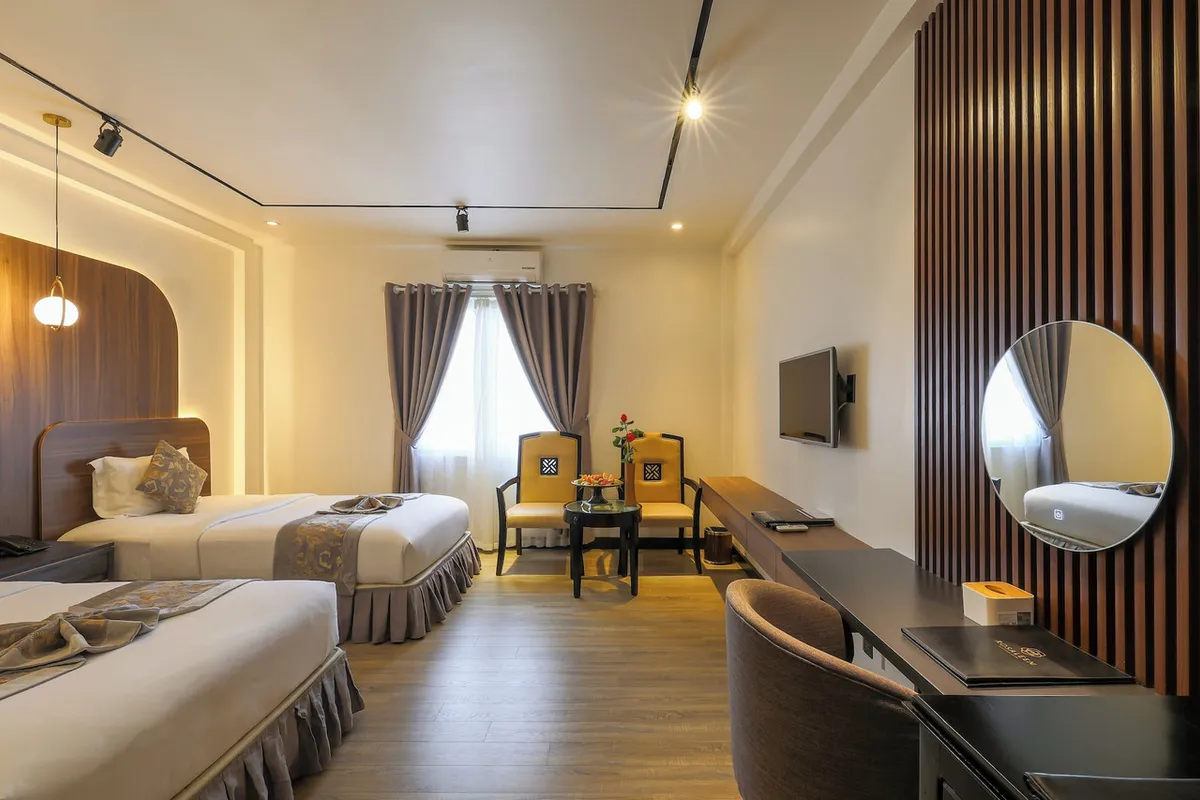 Rosaleen Boutique Hotel Hue — rooms and atmosphere