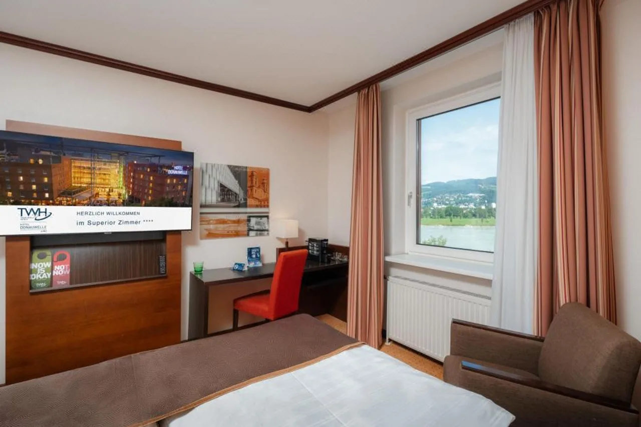 Steigenberger Hotel Linz — ภาพห้องพักและบรรยากาศ