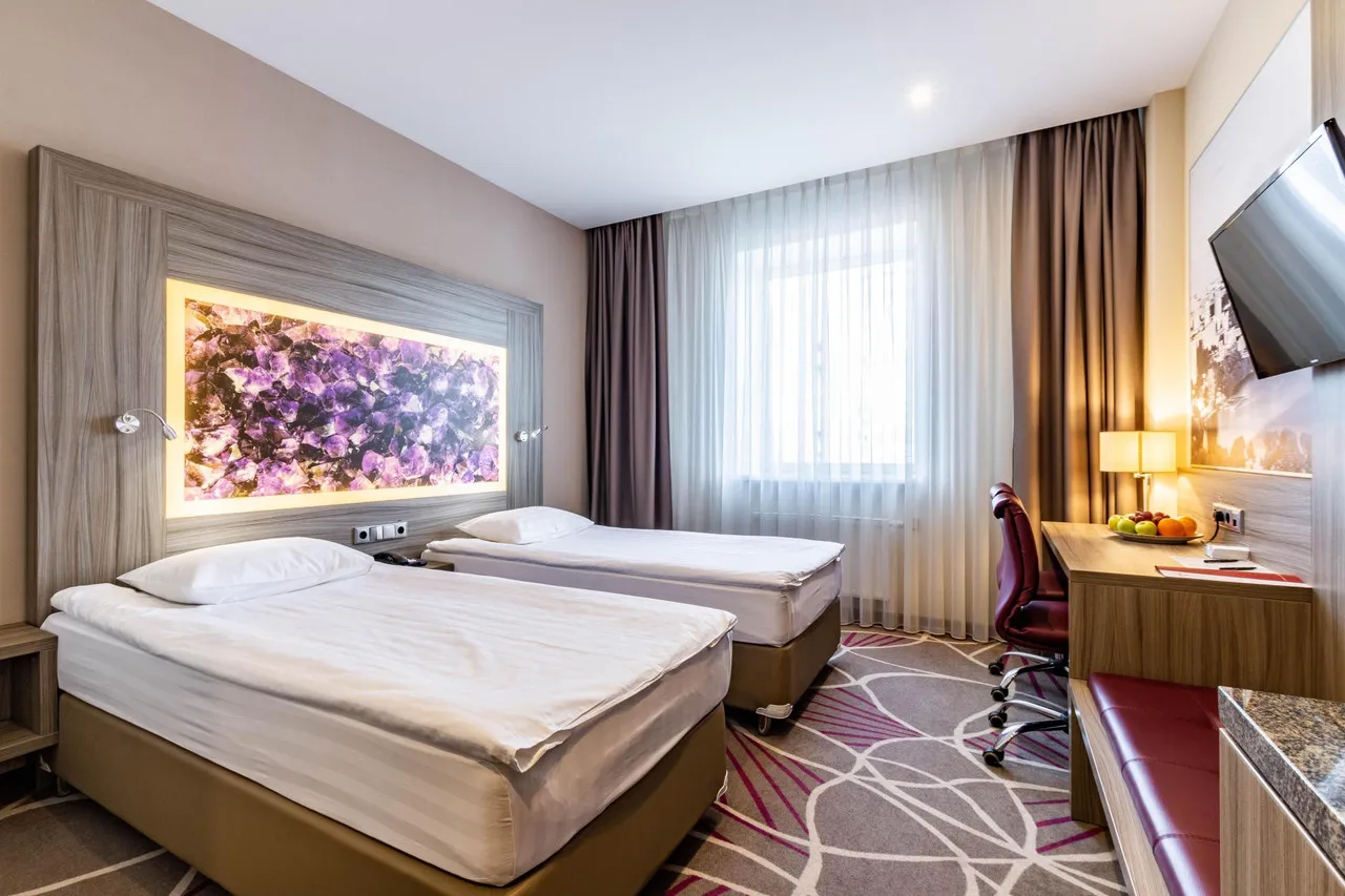 Tenet Hotel — rooms and atmosphere
