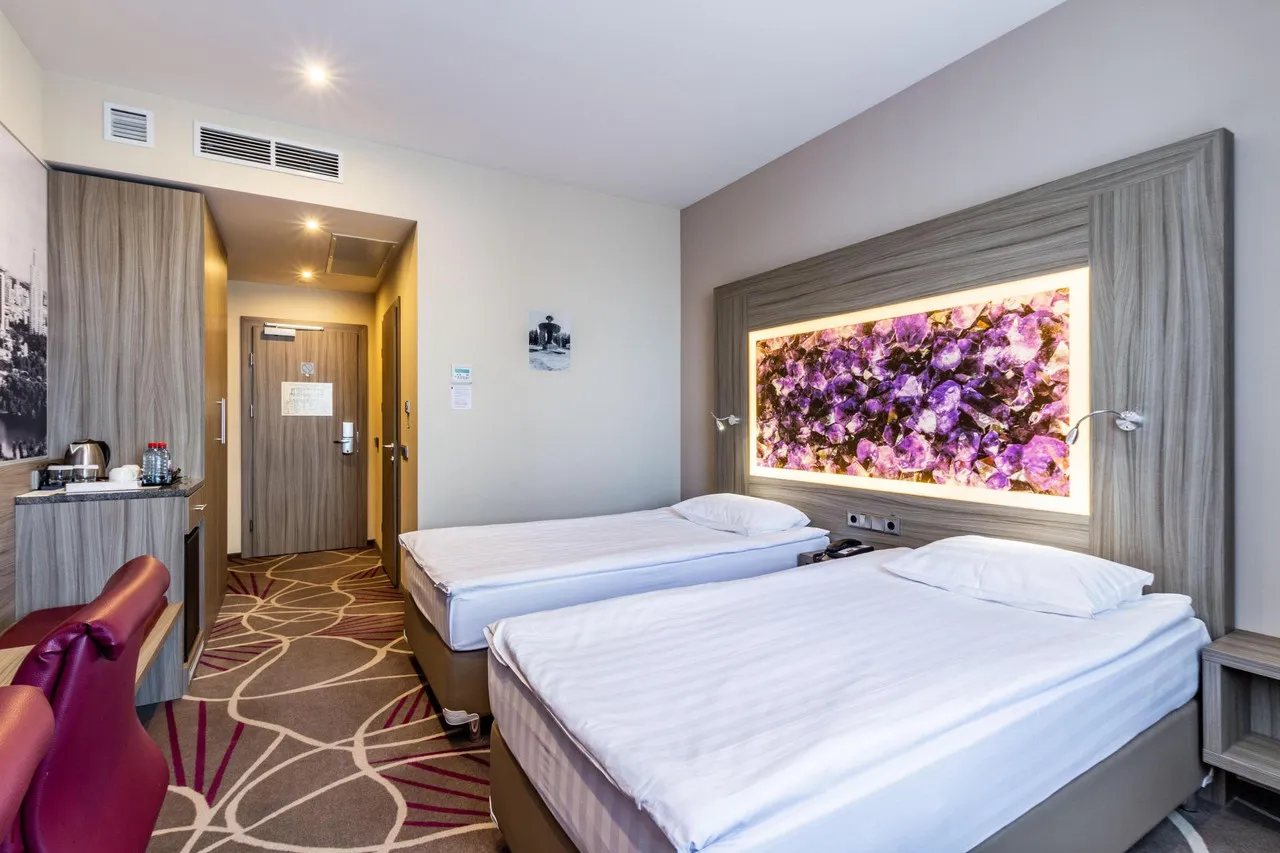 Tenet Hotel — rooms and atmosphere