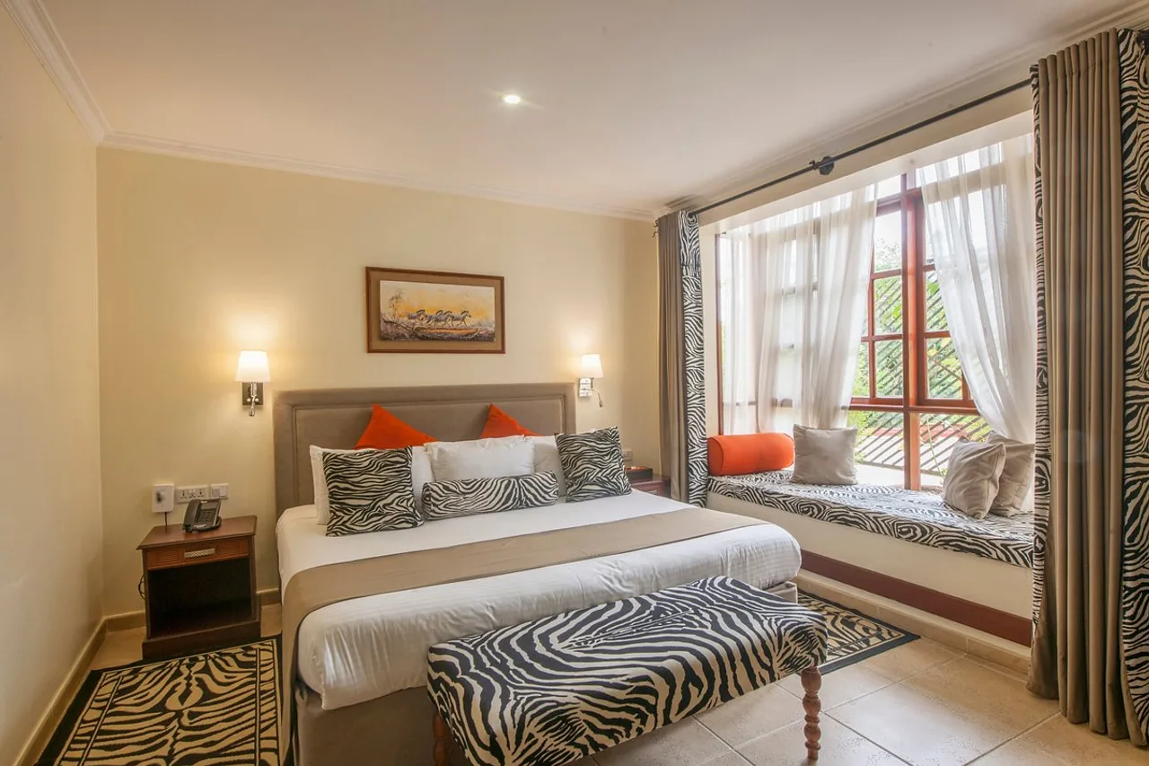 The African Tulip Hotel — ภาพห้องพักและบรรยากาศ