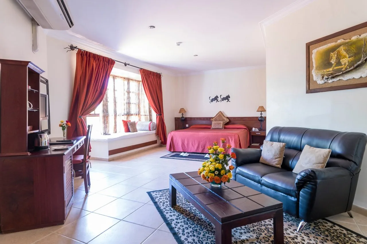 The African Tulip Hotel — ภาพห้องพักและบรรยากาศ
