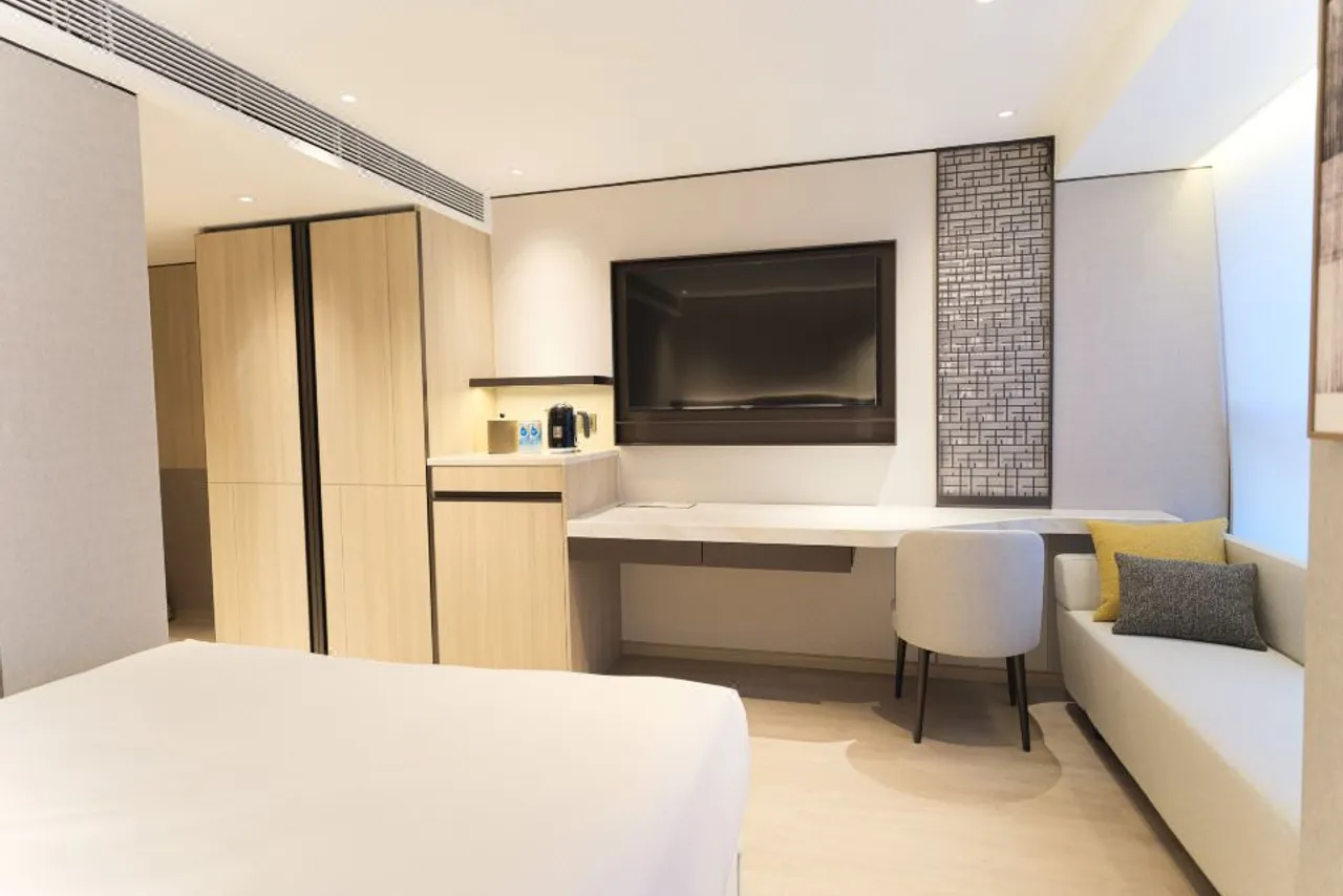 The Bauhinia Hotel - Central — ภาพห้องพักและบรรยากาศ