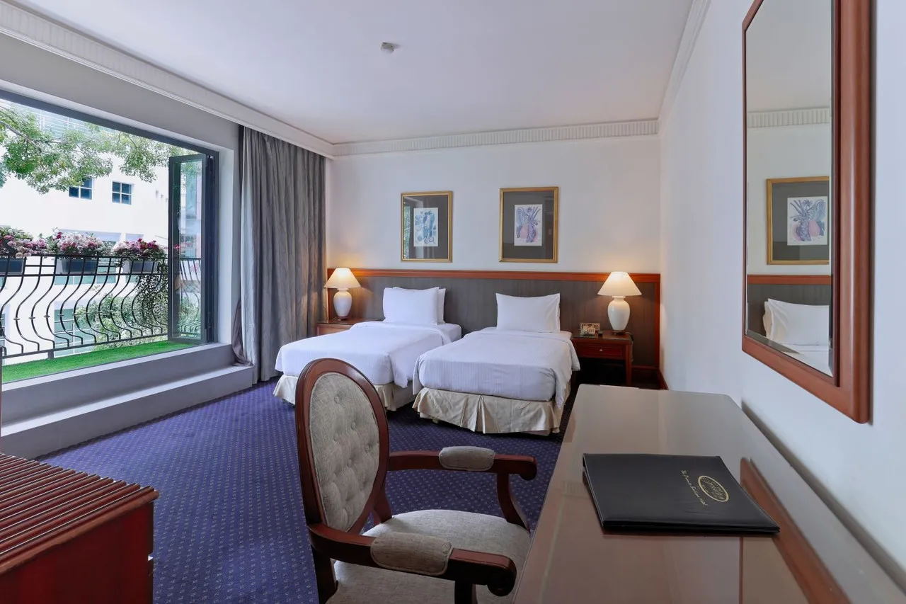 The Jesselton Hotel — rooms and atmosphere
