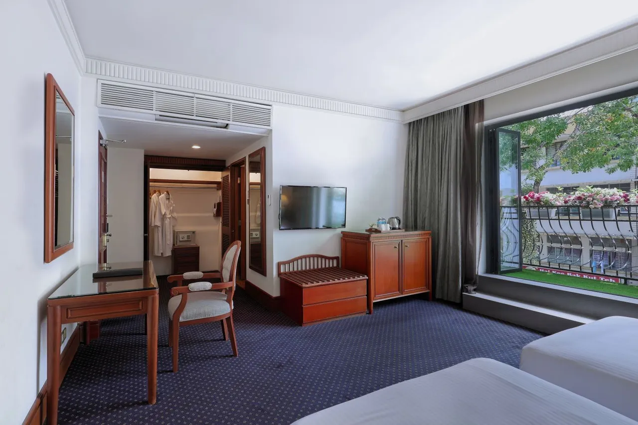 The Jesselton Hotel — rooms and atmosphere