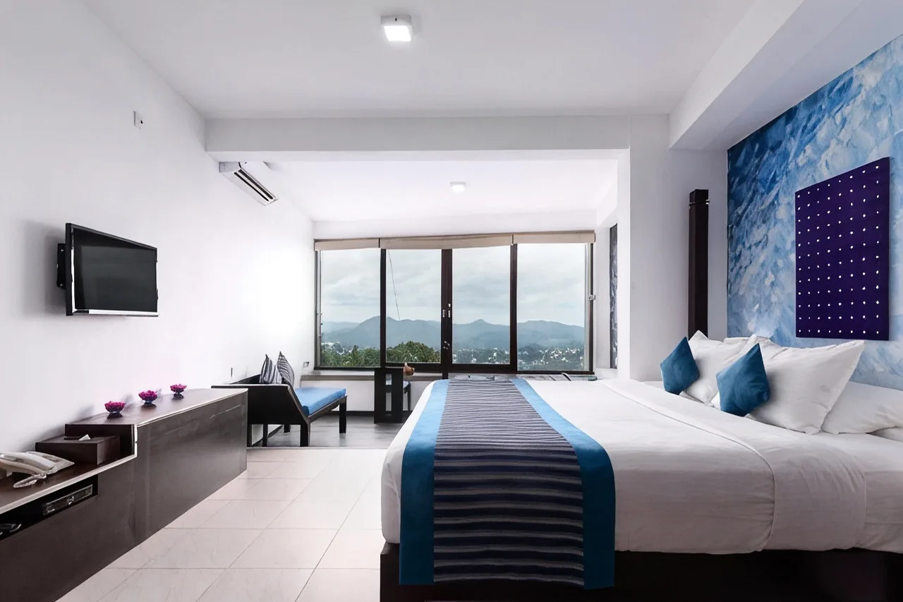 The Theva Residency — ภาพห้องพักและบรรยากาศ