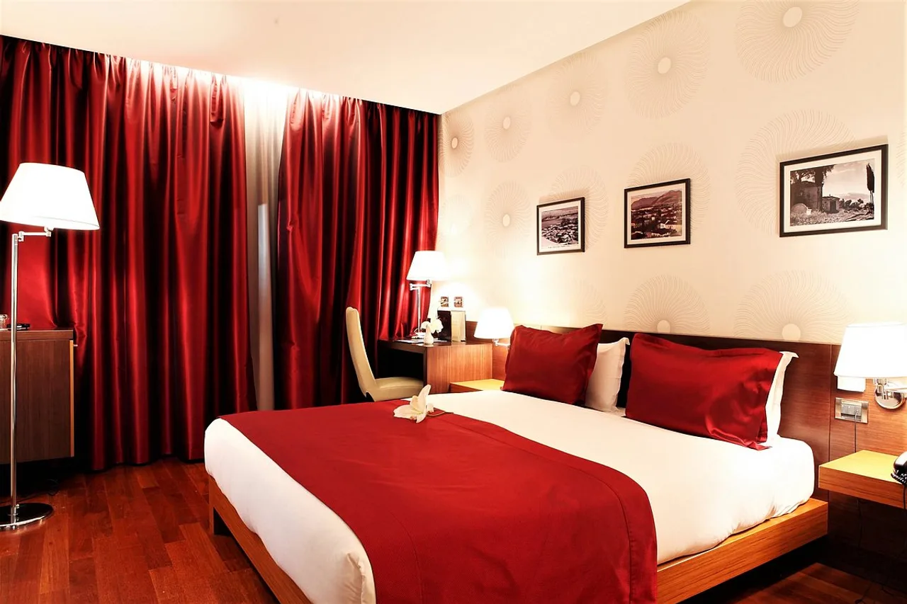 Tirana International Hotel & Conference Centre — rooms and atmosphere